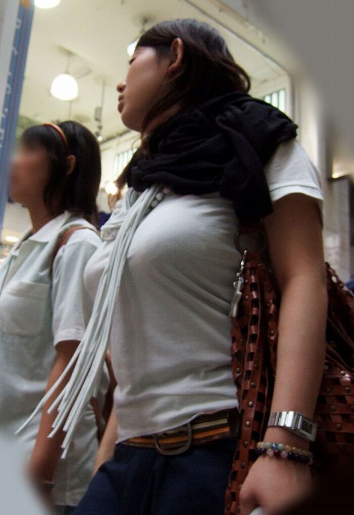 Photograph amateur girls dressed in clothes that look bigger than busty breasts in the city 5th image