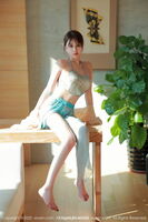 XiuRen第5679期_模特tina_甜仔香格里拉旅拍淡蓝色丝绸布兜秀凹凸身Material诱惑Photo 51P