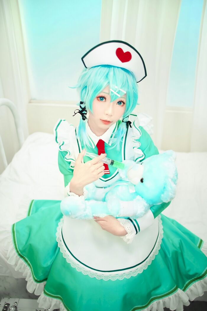 Coser妹子Ely_eee诗乃护士主题私房性感绿色护士装秀完美身材迷人诱惑写真32P 18th image